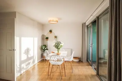 a dining room with a table and chairs at City Views by the Castle, Free Designated Parking. in Stirling