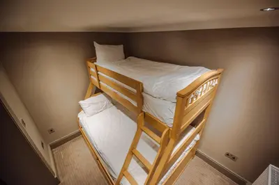 a couple of bunk beds in a small room at Bowfield Hotel and Spa in Howwood