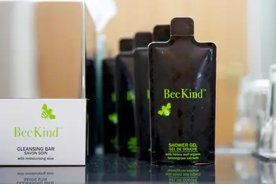 a bottle of back kindologne sitting on a counter at The Knight Residence by Mansley in Edinburgh