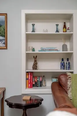 a living room with a couch and a table at No7 Drummond Street, 2 bedrooms, Comrie in Comrie