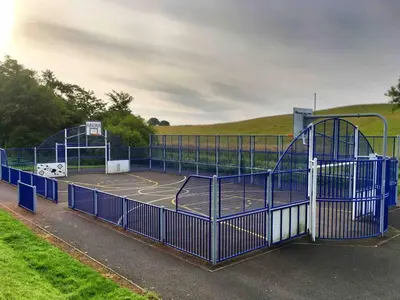 a blue basketball court with a basketball hoop at Keppochhill - Beautiful Home with Hot Tub in Banton
