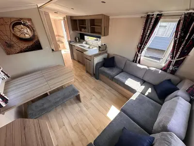 an aerial view of a living room and kitchen in a caravan at 3-Bedroom Swift Caravan - Located in Uddingston, Glasgow at Maryville Caravan Site in Glasgow