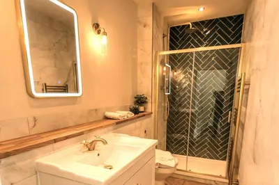 a bathroom with a sink and a shower at 'Blair' in ApartNest Auchterarder in Auchterarder