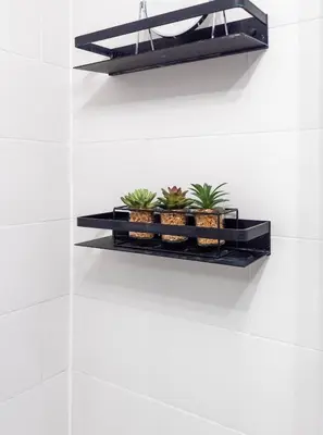 a shelf on a white wall with plants on it at 1 BDR Apt At Caledonia Luxe Stays Short Lets & Serviced Accommodation Paisley in Paisley