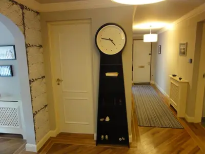 a clock on the wall in a hallway at Orchard Brae in Edinburgh