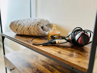 a hair dryer sitting on a wooden table at Longbank Luxury Lets in Ayr