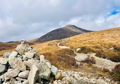 a pile of rocks on top of a mountain at Longbank Luxury Lets in Ayr