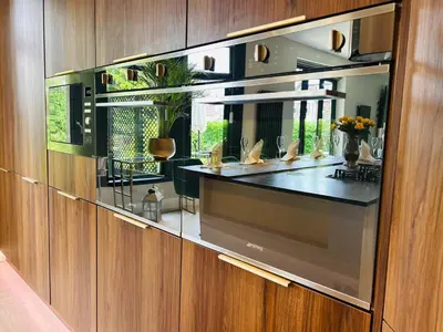 a large glass display case in a room at Longbank Luxury Lets in Ayr