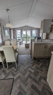 a room with a kitchen and a living room at The Brockenhurst 25 in Dunoon