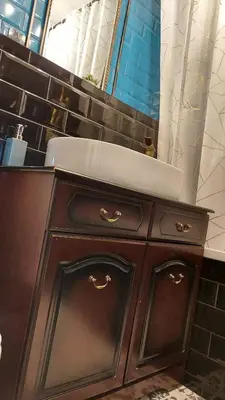 a bathroom vanity with a sink and a mirror at Luxurious room with a private bathtub and shared toilet and kitchen 10mins from City Centre in Bailleston