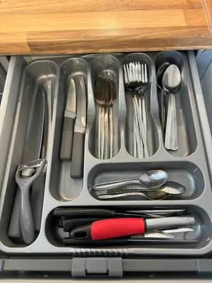 a drawer filled with utensils in a drawer at Golf View in Prestwick