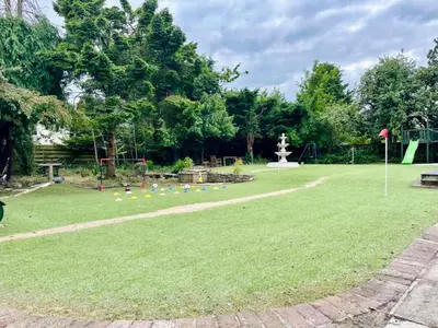 a grassy area with a fountain and a park at Edinburgh full house in Edinburgh