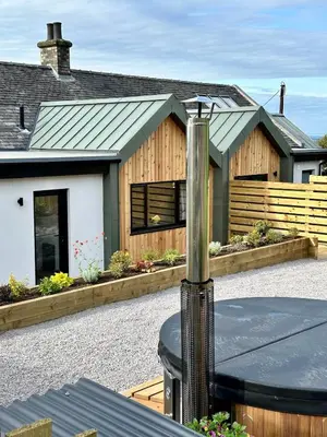 a house with a table in front of it at Firth View 2 - Country Escape with Sea Views of Arran! in Ayr