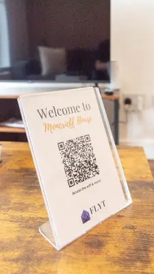 a sign that says welcome to macquarievelt house at Moncrieff House in Livingston