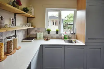 a kitchen with a sink and a window at Modern house near Glasgow 3bdr in Dalmuir