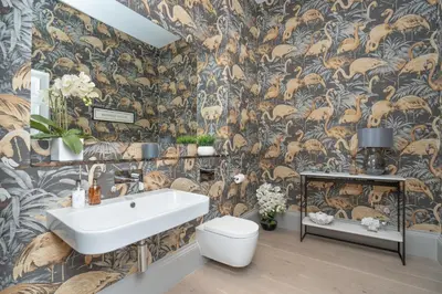 a bathroom with a toilet and a sink at Georgian Gem in the New Town in Edinburgh