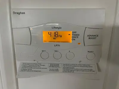 a machine with a digital clock on the front of it at Foundry Street Apartment 2 - Dunfermline city centre in Dunfermline