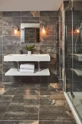 a bathroom with a sink and a shower at Craig Chat in Oban