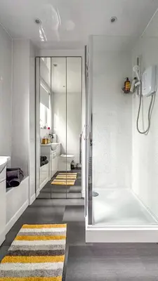 a bathroom with a shower and a bath tub at Quite Charming house near Glasgow in Clydebank