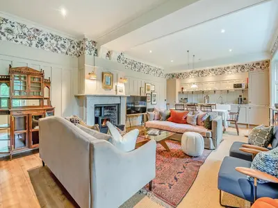 a living room filled with furniture and a fireplace at Uk47811 - Baillies Cottage in Kinloch Rannoch