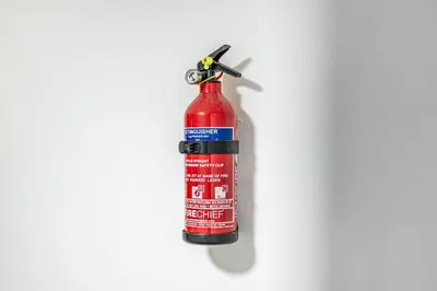 a fire extinguisher hanging on a wall at Pure Home Rosyth Dockyard by TBA in Rosyth