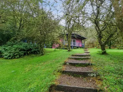 a group of steps leading to a pink house at Lodge 5 - 