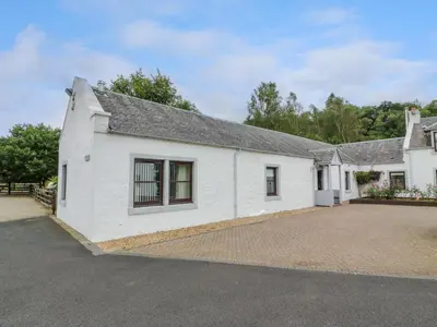 an image of a white house with a driveway at The Barn at Daldorch in Mauchline