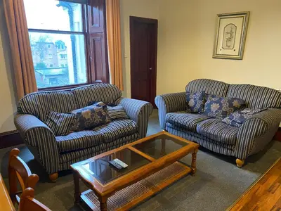 a living room with two couches and a coffee table at townhouse apartments in Ayr