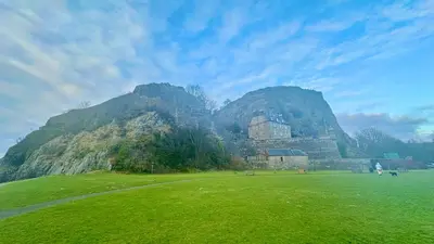 a green field with a mountain in the background at Flat for 6 guests near Glasgow, Loch Lomond in Dumbarton