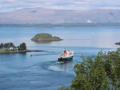 a large boat in a large body of water at Seaview Lismore House in Oban