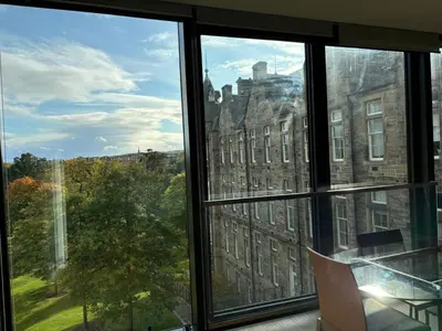 a view of a building from a window at Stunning park view Quartermile apartment close proximity to Castle University in Edinburgh