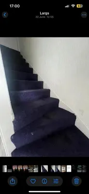 a picture of a staircase with purple carpet at Largs 2 bedroom Apartment in Largs