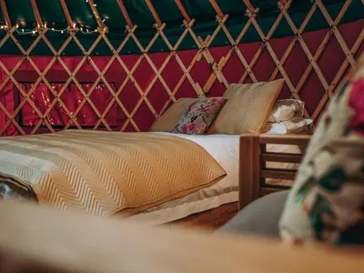 a bedroom with a bed in a yurt at Timothy Yurt - Uk47889 in Keilour