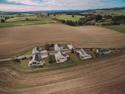 an aerial view of a large house in the middle of a field at Dovecote - Uk47887 in Keilour