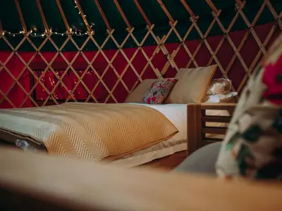 a bedroom with a bed in a yurt at Moss Yurt - Uk47888 in Keilour