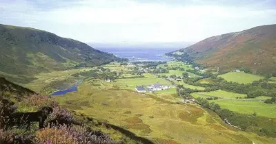 a painting of a valley in the mountains at Lochranza Centre CIC in Lochranza