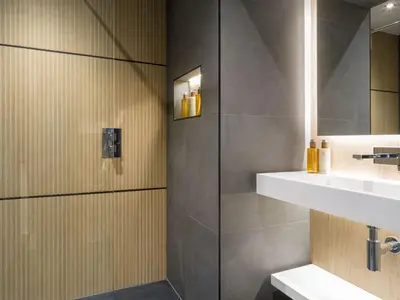 a bathroom with a shower and a sink at Arran Shores Luxury Shorefront Suite 1 in Lamlash
