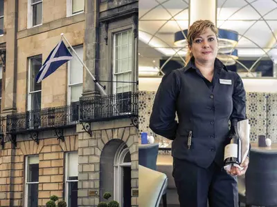 a woman is standing in front of a building at Mercure Edinburgh Haymarket in Edinburgh