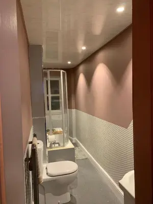 a bathroom with a toilet and a sink at Charming 2 Bed Apartment in the heart of the West End in Glasgow