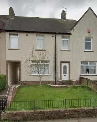 a large house with a grass yard in front of it at 3 bedroom terraced house in Larkhall