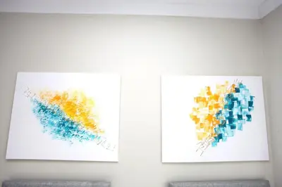 two pieces of art on a wall at Three Bedroom Upper Flat in Jordanhill in Glasgow