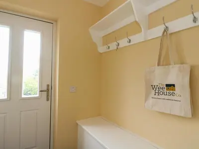a laundry room with a bag on the wall at Tirlaggan Úr in Oban