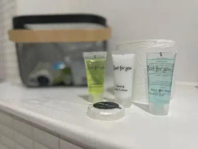 a counter top with two bottles of moisturizing moisturizers and a bottle of disinfect at Glasgow River Clyde Hydro Aprt in Glasgow