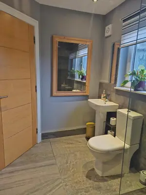 a bathroom with a toilet and a sink at Beolary in Oban