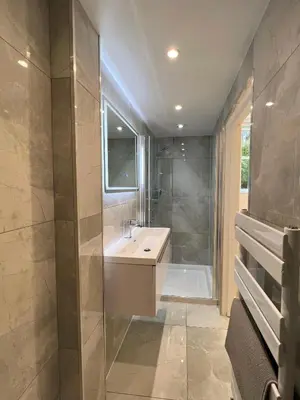 a bathroom with a sink and a bath tub at Edinburgh city centre 1Bed flat near Castle & Uni in Edinburgh