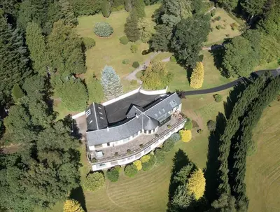 an aerial view of a large building in a field at Invercreran House in Appin