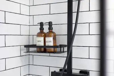 a shelf on a wall with bottles on it at Extravagant 6 Bed Victorian Townhouse with Hot Tub in Glasgow