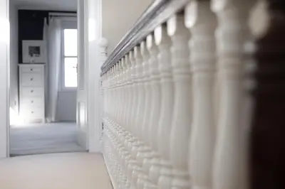 a white wall in a room with a hallway at Extravagant 6 Bed Victorian Townhouse with Hot Tub in Glasgow