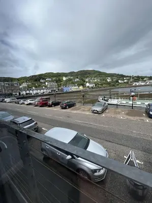 a car parked on the side of a road at Bielding View Tarbert Loch Fyne Argyll in Tarbert