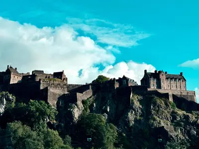 a castle perched on top of a mountain at Rose Street flat in Edinburgh